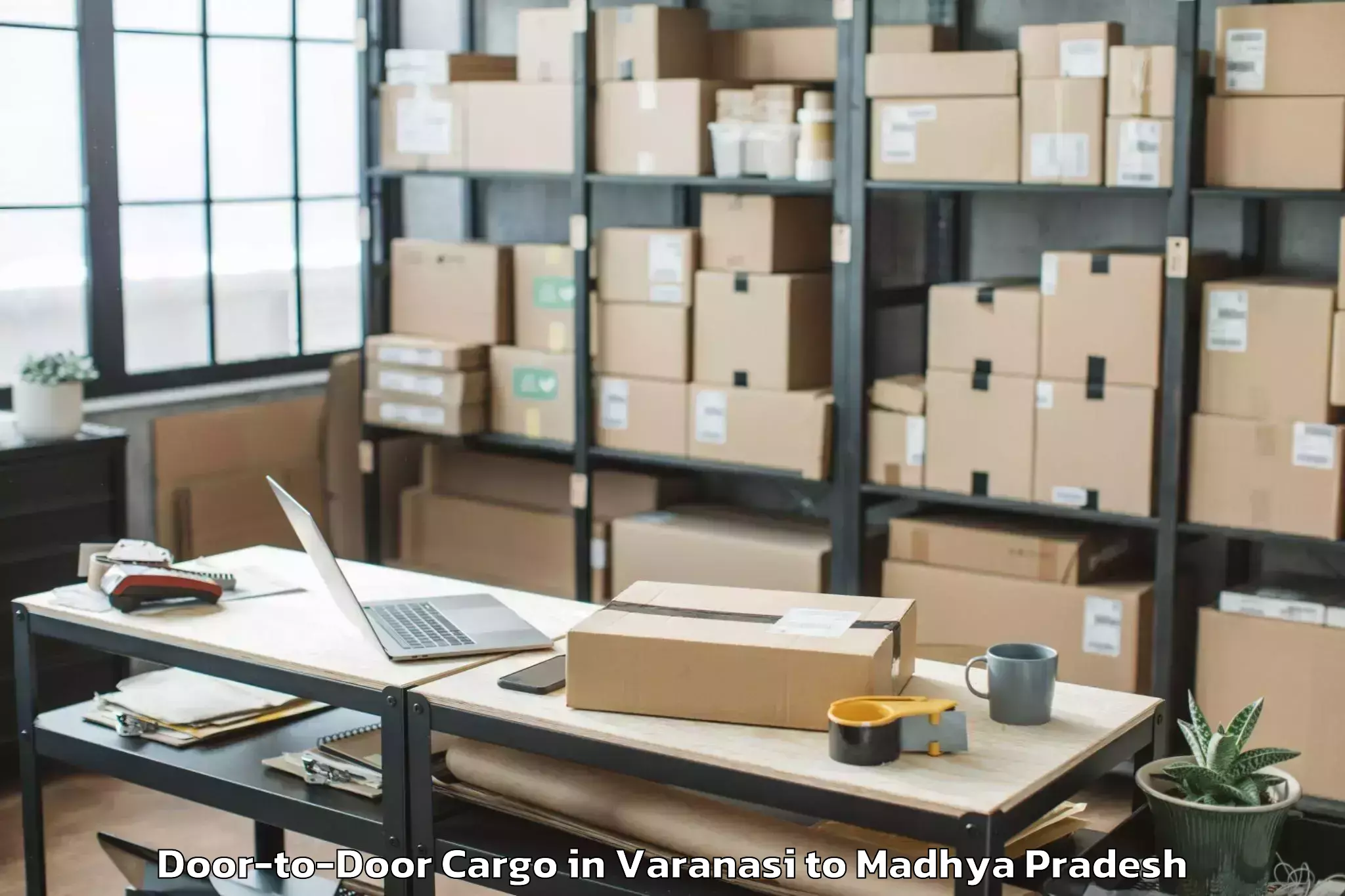 Book Varanasi to Khandwa Door To Door Cargo Online